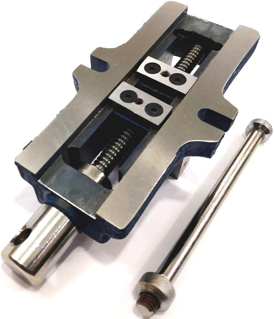 Bench milling work supported by rigid fixed base vertical slide