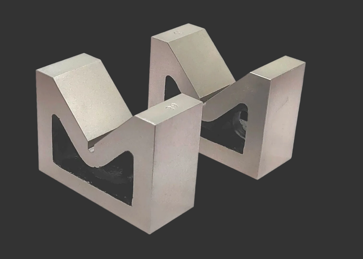 Seasoned caste iron v block pair